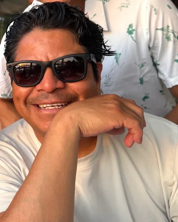 Abel Lopez, smiling, in sunglasses
