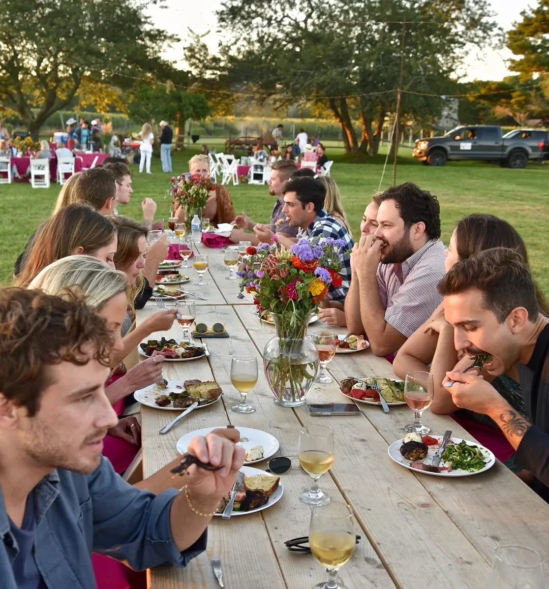 An outdoor table set for a celebration at Channing Daughters